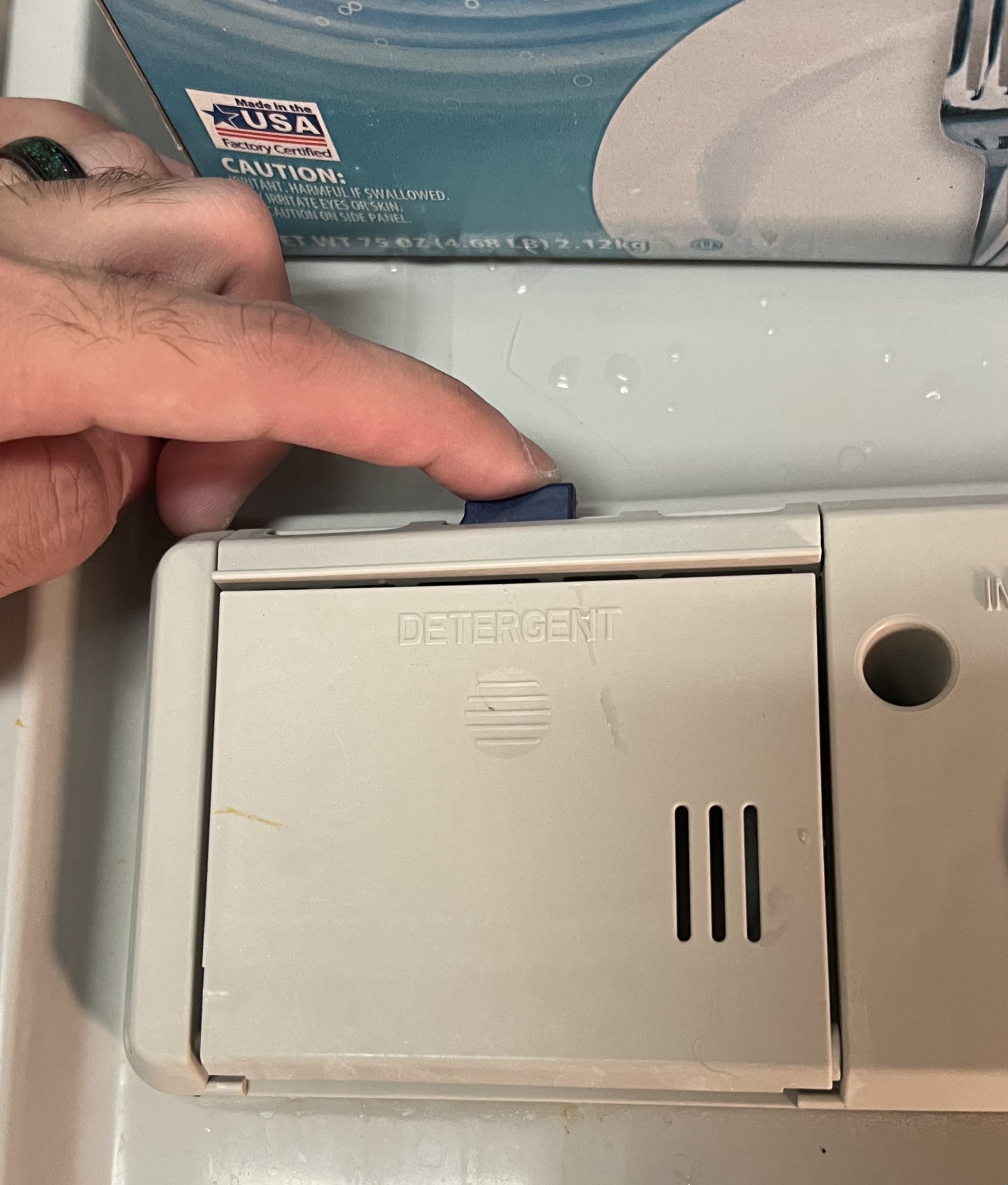 Opening Detergent Compartment