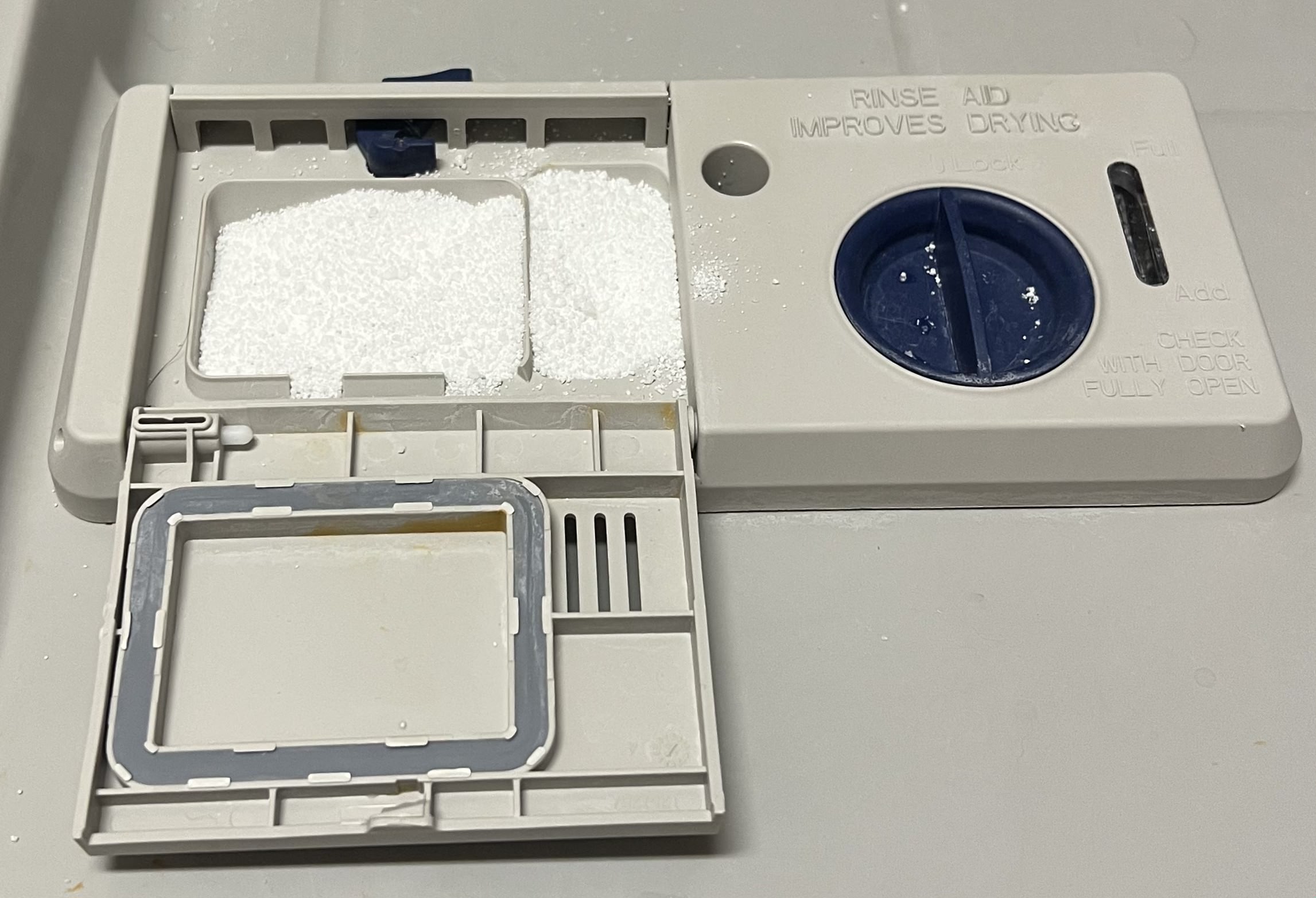 Powder in Detergent Compartment
